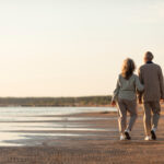 Happy couple on the beach.